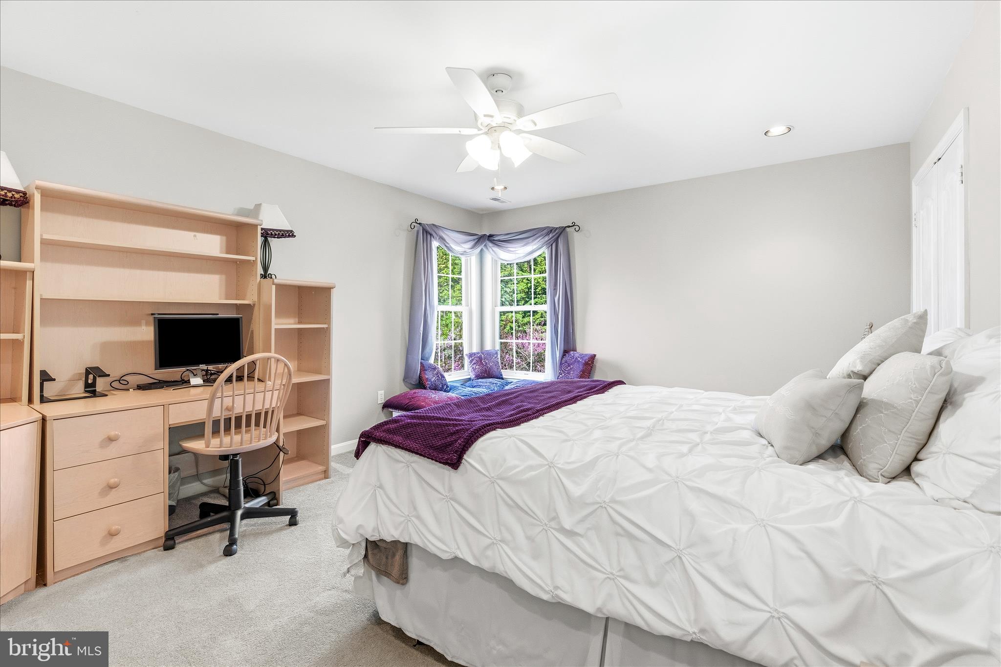 4114 Lomar Terrace Mount Airy, MD 21771 - Photo 45 of 91 a bedroom with a bed and a flat screen tv