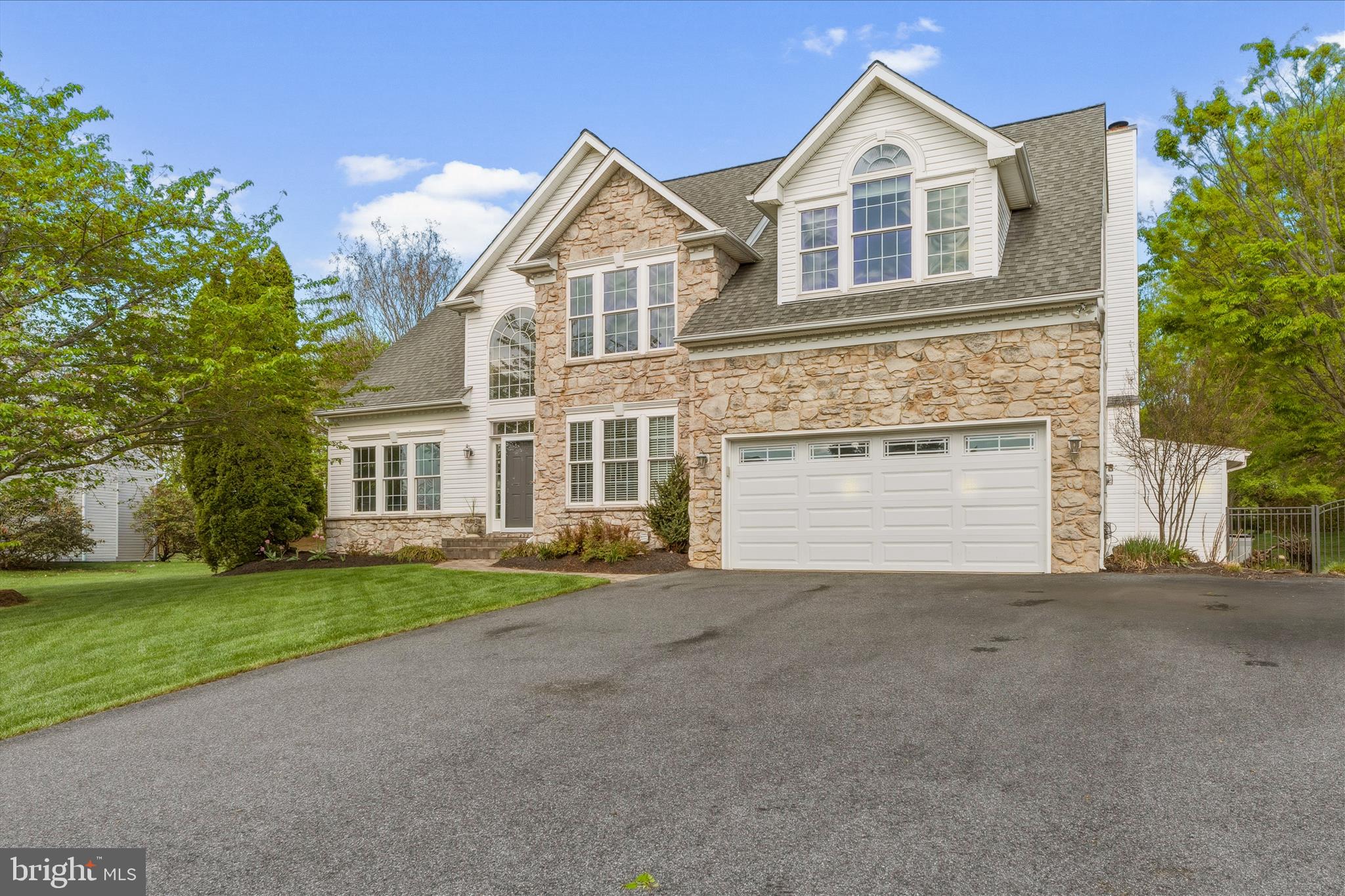 4114 Lomar Terrace Mount Airy, MD 21771 - Photo 5 of 91 a view of a house with a yard and large tree