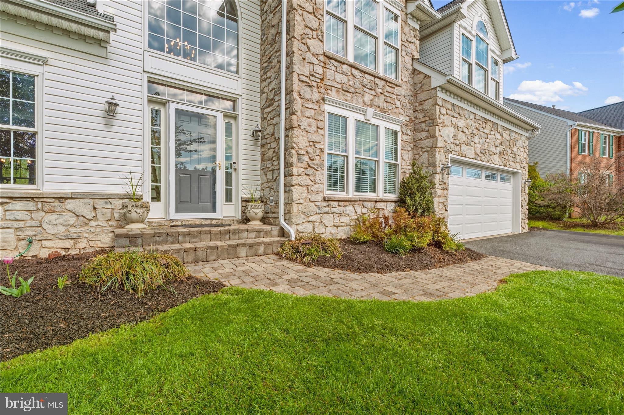 4114 Lomar Terrace Mount Airy, MD 21771 - Photo 6 of 91 a front view of a house with a yard