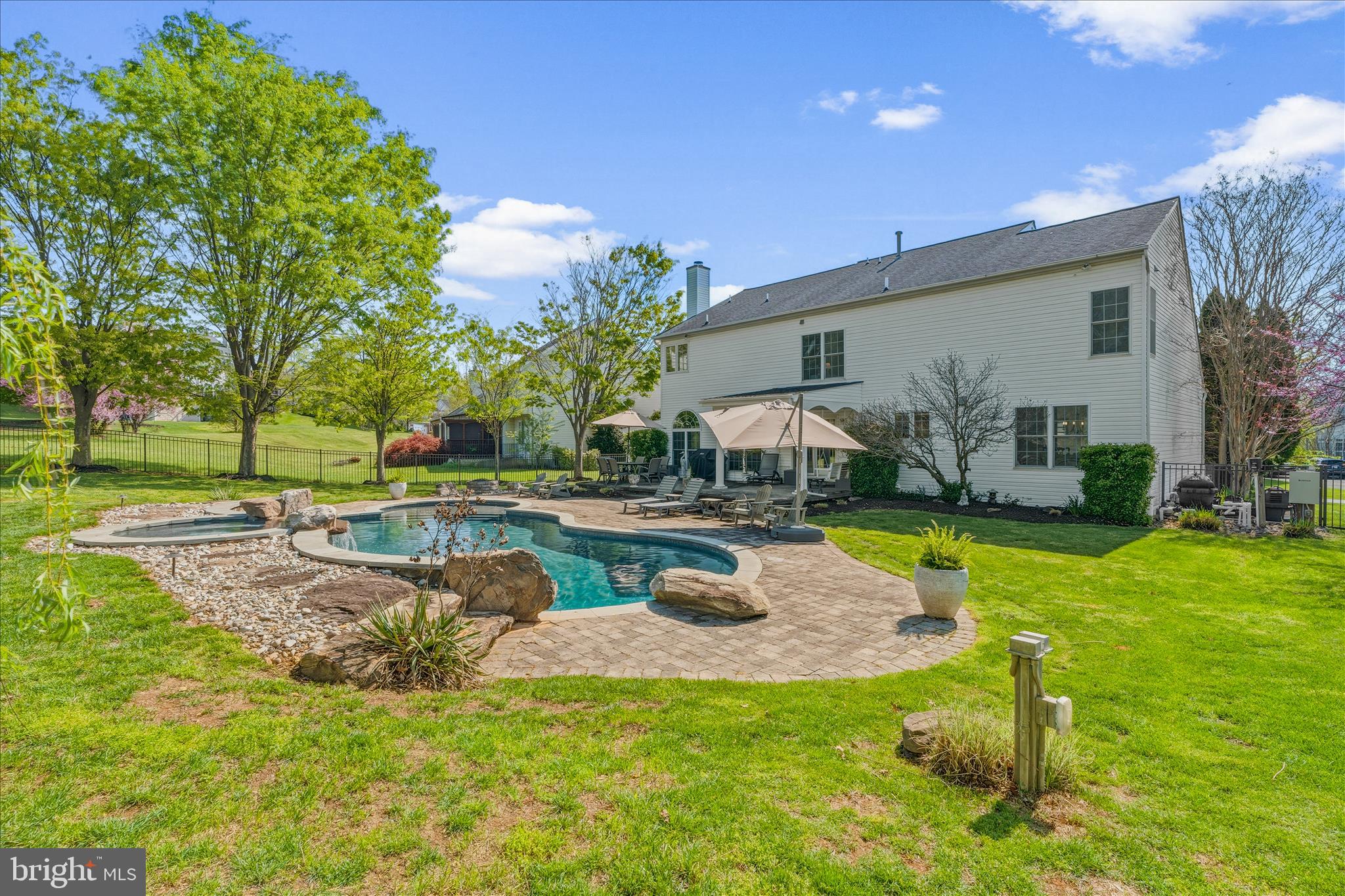 4114 Lomar Terrace Mount Airy, MD 21771 - Photo 70 of 91 a view of a house with swimming pool and a yard