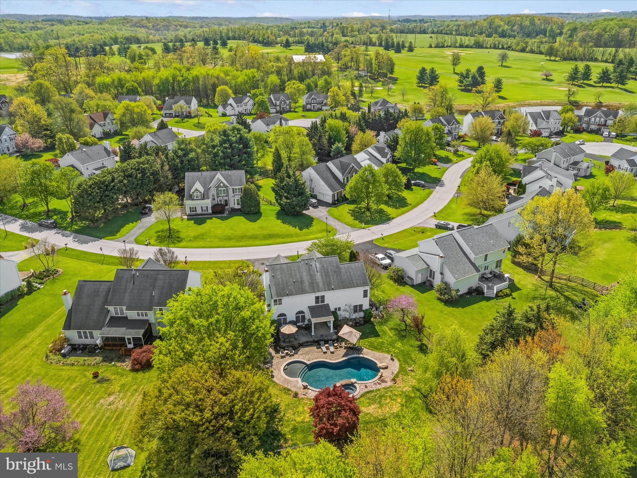 4114 Lomar Terrace Mount Airy, MD 21771 - Photo 80 of 91 an aerial view of residential houses with outdoor space and swimming pool