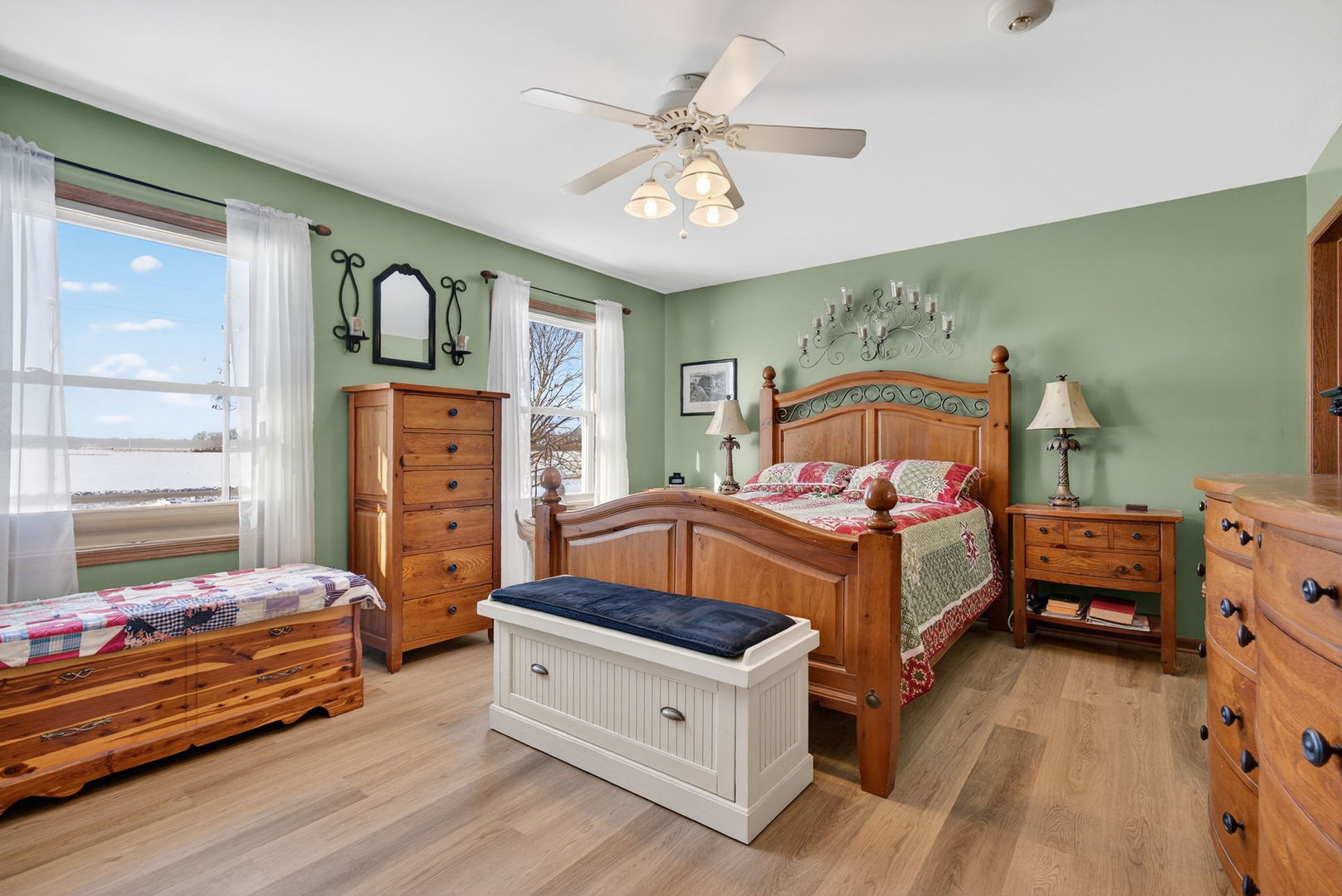 2420 North Dwight Road Morris, IL 60450 - Photo 18 of 38 a bedroom with a bed and a chandelier