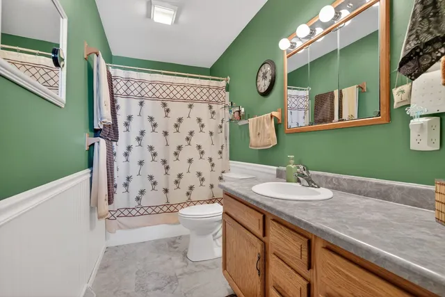 a living room with a bed