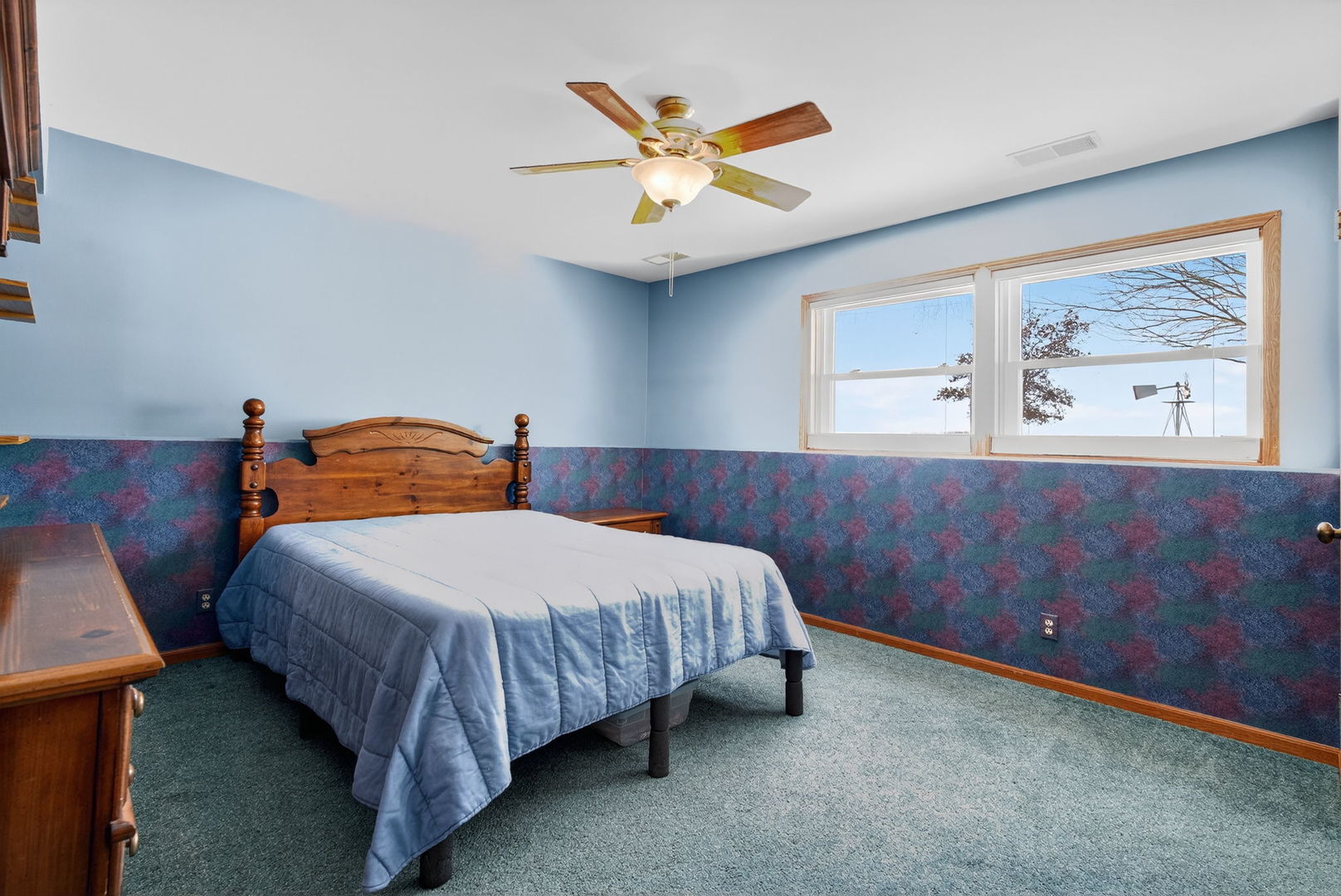 2420 North Dwight Road Morris, IL 60450 - Photo 21 of 38 a bedroom with a bed and window