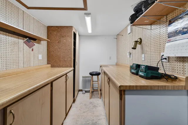 a view of a dinning table and chairs in the patio
