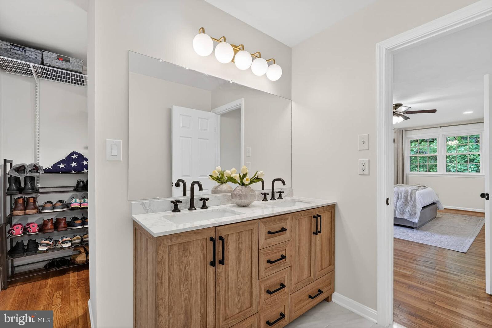 500 Finsbury Road Silver Spring, MD 20904 - Photo 25 of 54 a bathroom with a sink vanity and a mirror
