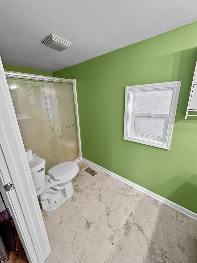 28611 Mall Road Ingleside, IL 60041 - Photo 6 of 7 a bathroom with sink and a window