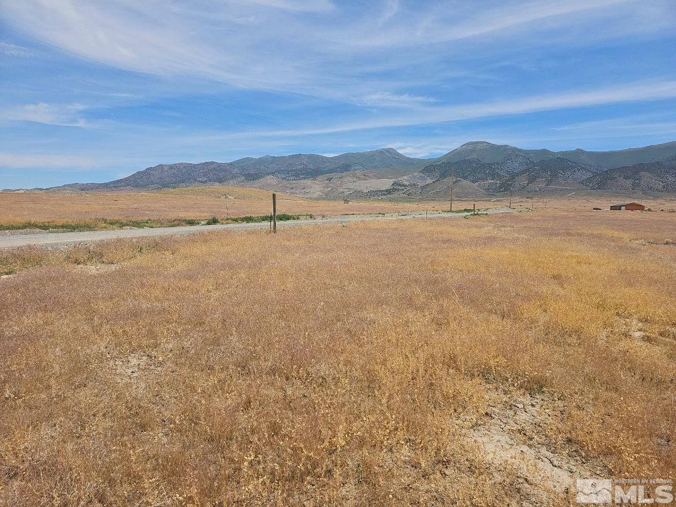 11385 New Exchequer Way, Unit 453 Lovelock, NV 89419 - Photo 6 of 12 a view of an lake and a mountain