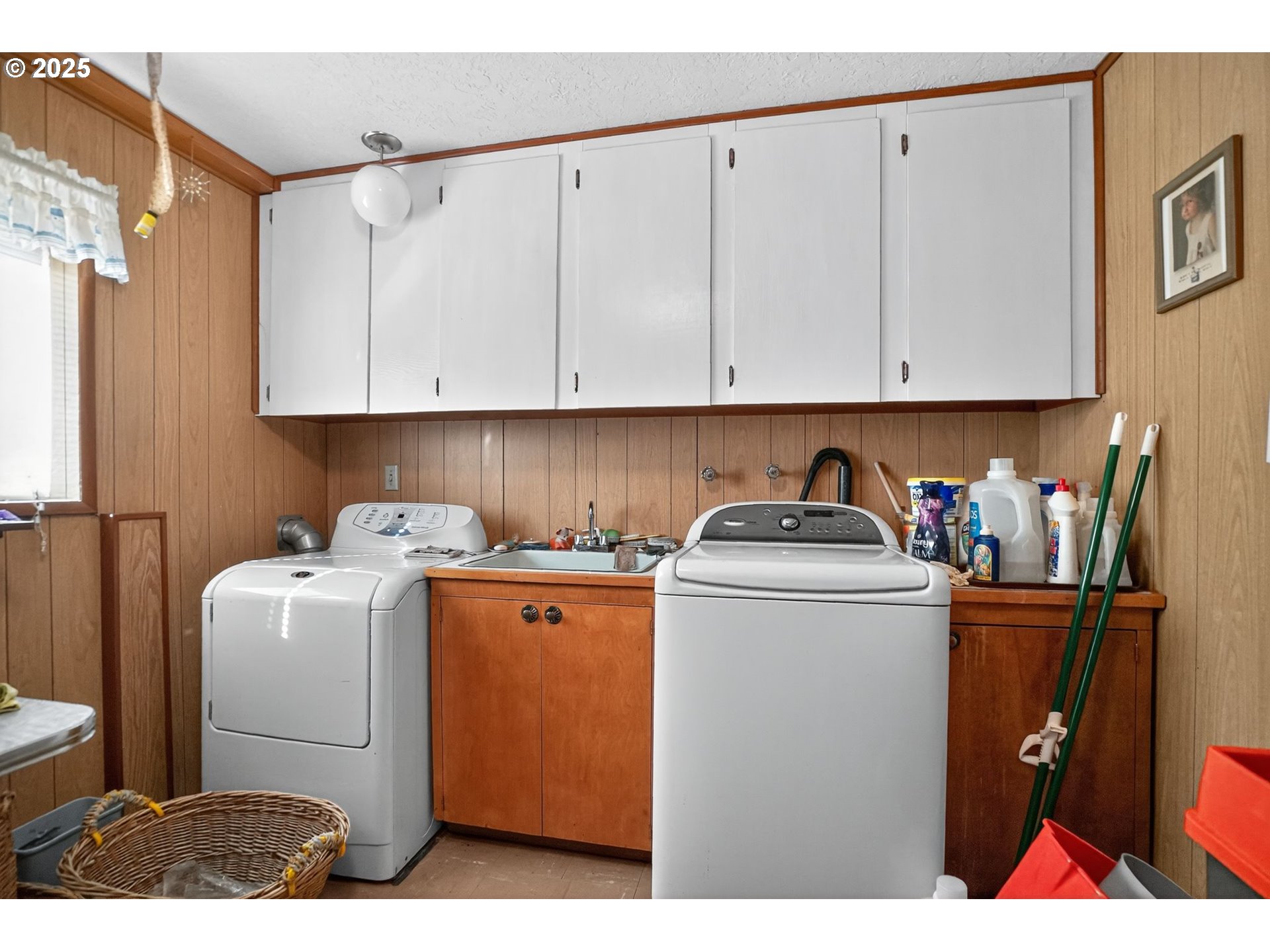 9479 Southeast Hillcrest Road Happy Valley, OR 97086 - Photo 17 of 30 a utility room with dryer and washer