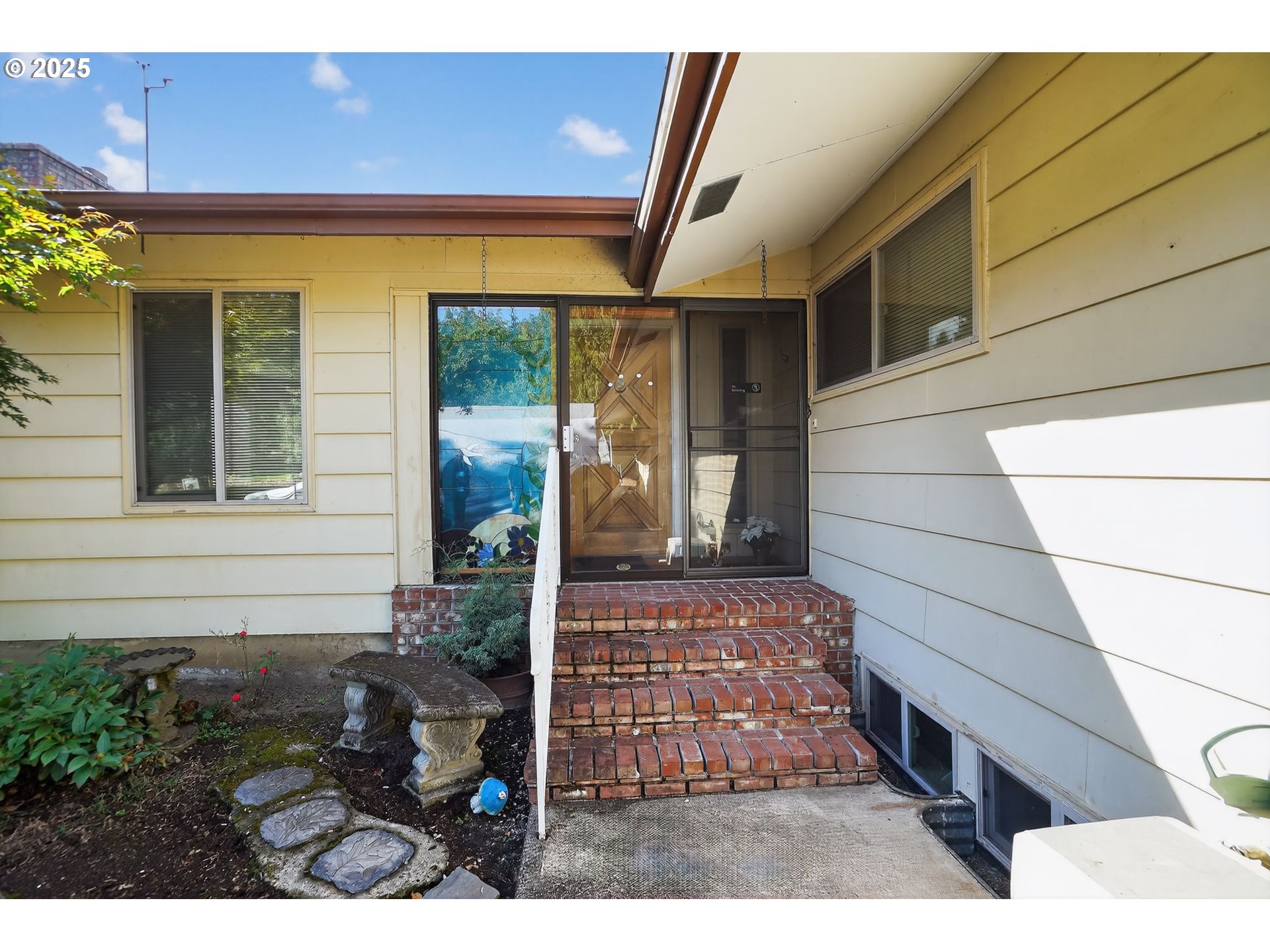 9479 Southeast Hillcrest Road Happy Valley, OR 97086 - Photo 4 of 30 a view of entrance front of the house