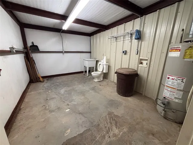 a backyard of a house with yard and garage