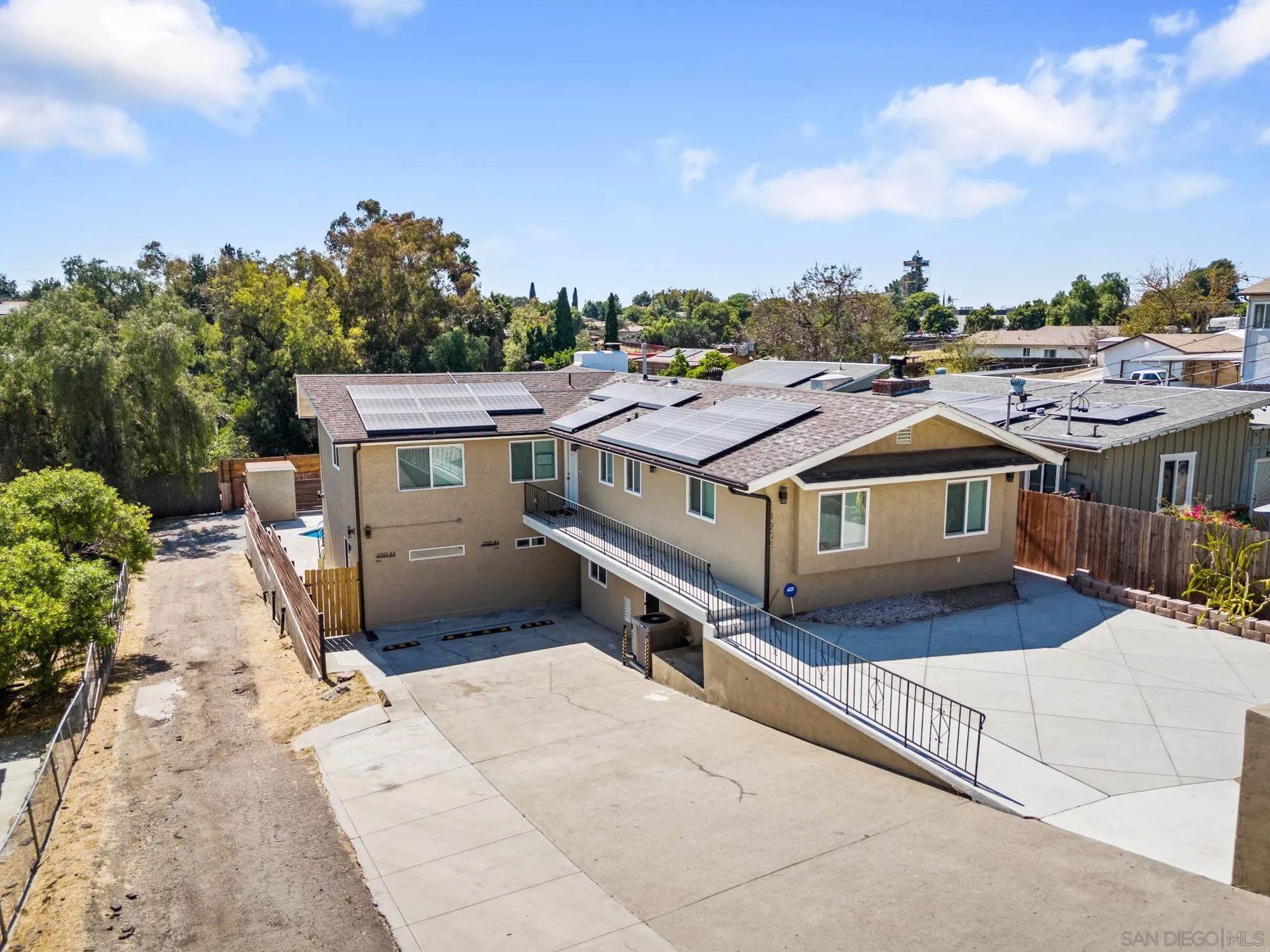 a aerial view of a house with a yard