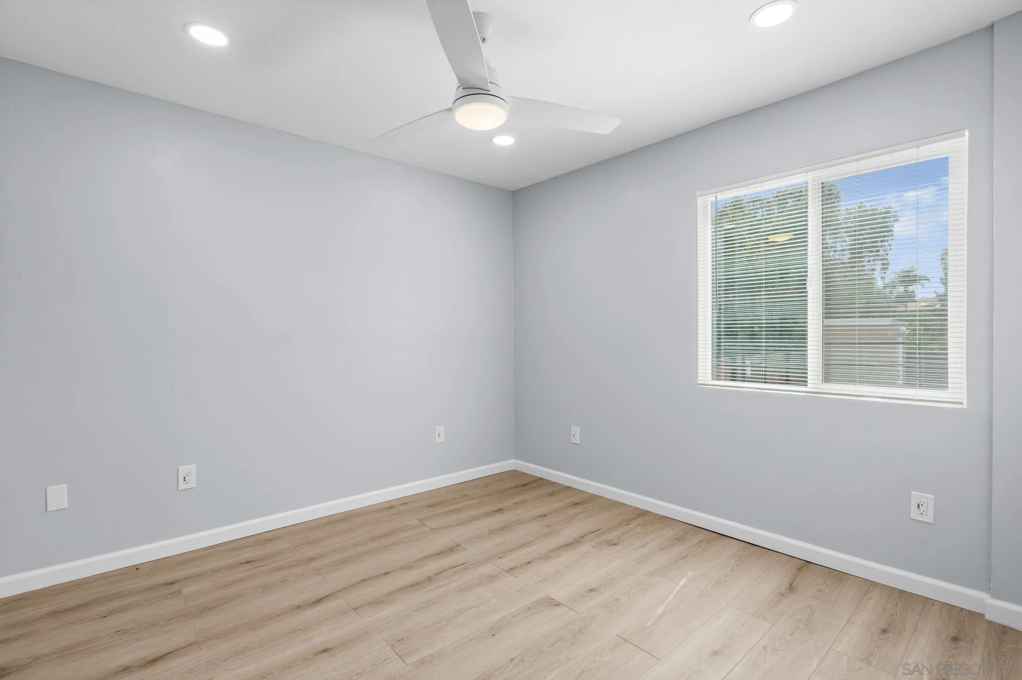 1908 Washington Street Lemon Grove, CA 91945 - Photo 33 of 54 an empty room with wooden floor and windows