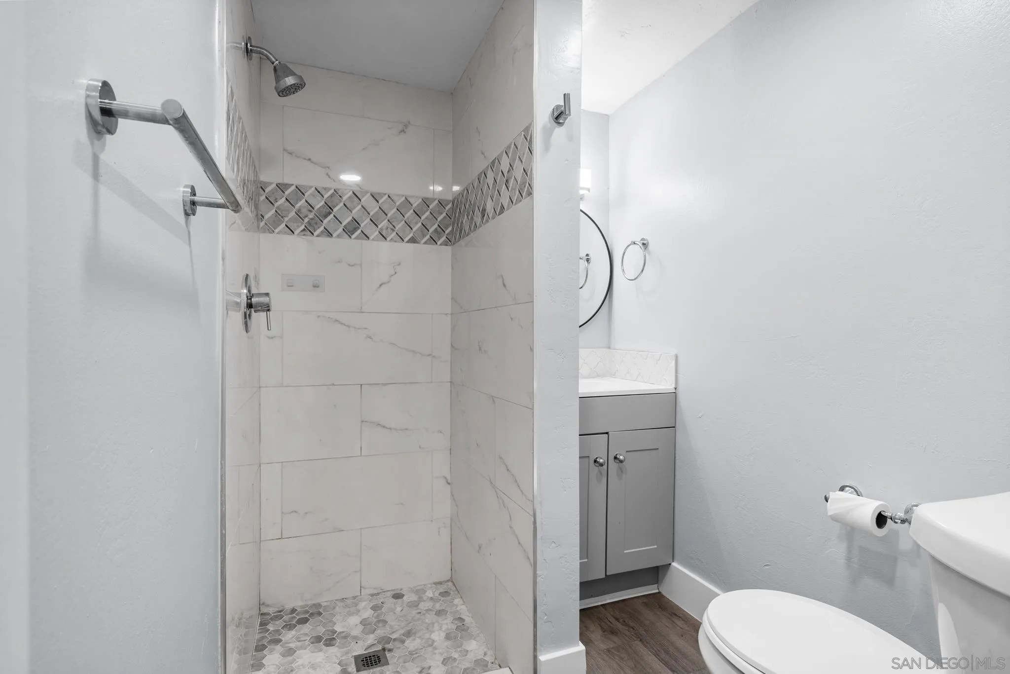 1908 Washington Street Lemon Grove, CA 91945 - Photo 39 of 54 a bathroom with a shower and toilet