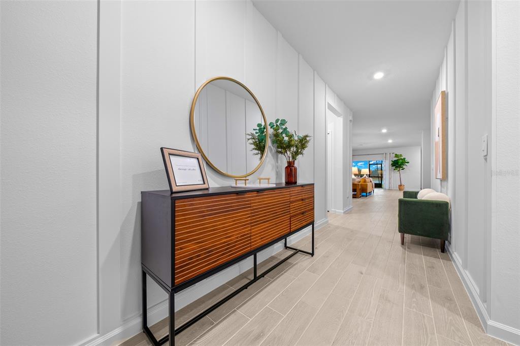 8735 Southwest 67th Circle Ocala, FL 34476 - Photo 15 of 35 a view of an entryway with wooden floor