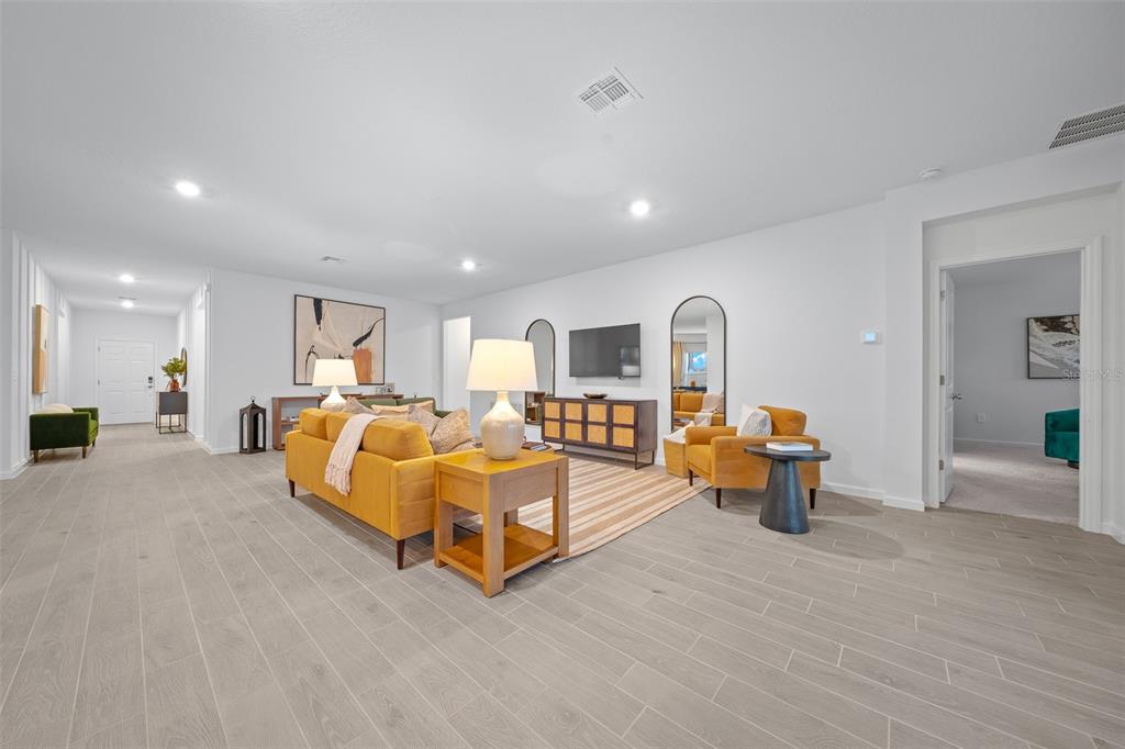 8735 Southwest 67th Circle Ocala, FL 34476 - Photo 24 of 35 a bed room with furniture and a table