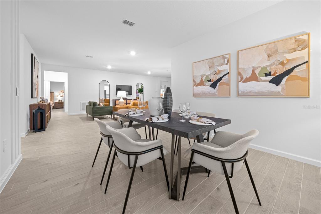 8735 Southwest 67th Circle Ocala, FL 34476 - Photo 26 of 35 a view of a dining room with furniture