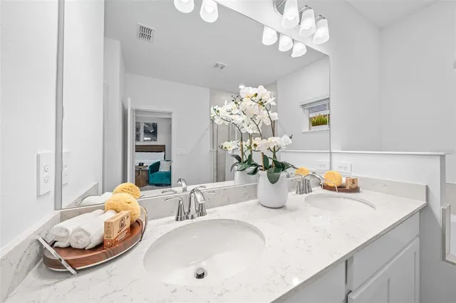 a view of a livingroom with furniture and a window
