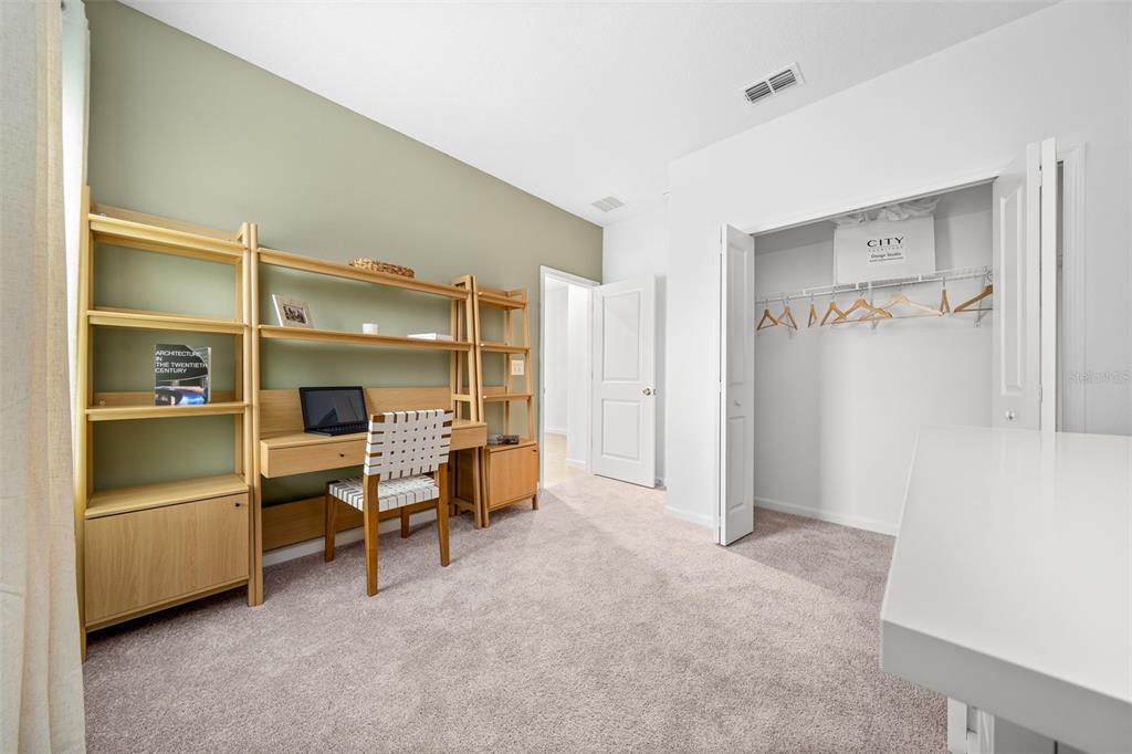 8735 Southwest 67th Circle Ocala, FL 34476 - Photo 31 of 35 a view of a livingroom with furniture and a window