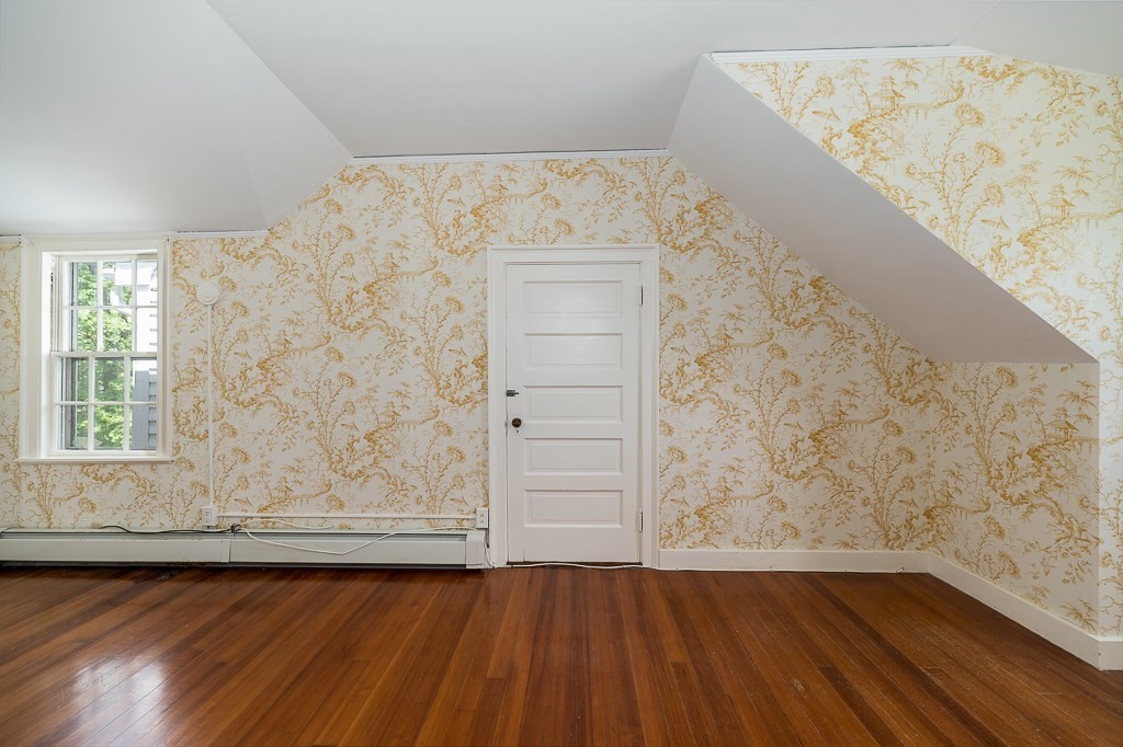 60 Walnut Road Wenham, MA 01984 - Photo 15 of 42 a view of a room with wooden floor and cabinet