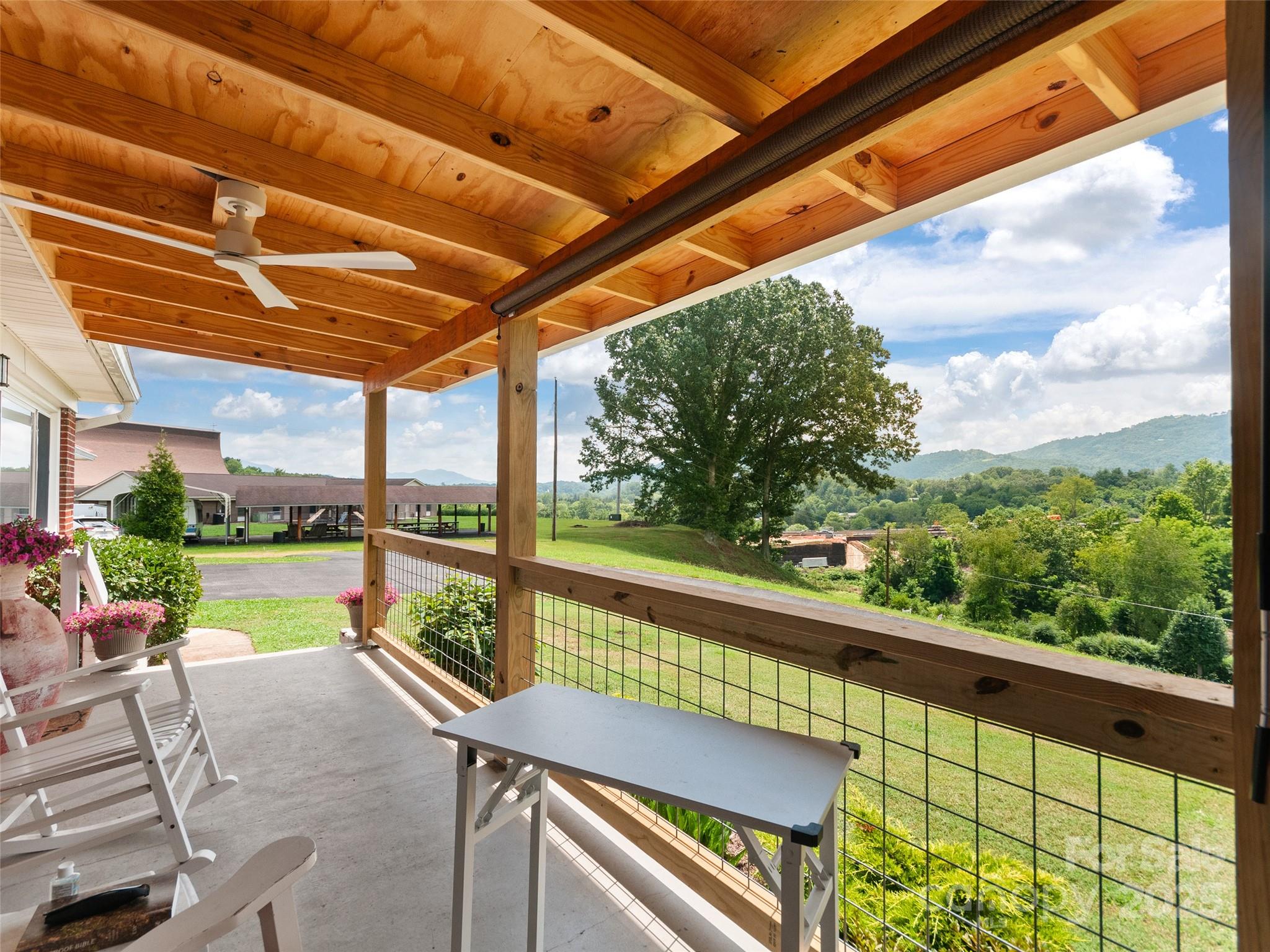 983 Lee Road Clyde, NC 28721 - Photo 5 of 41 a view of a two chair in the balcony