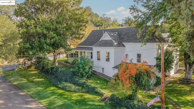 a bathroom with a toilet a sink and shower