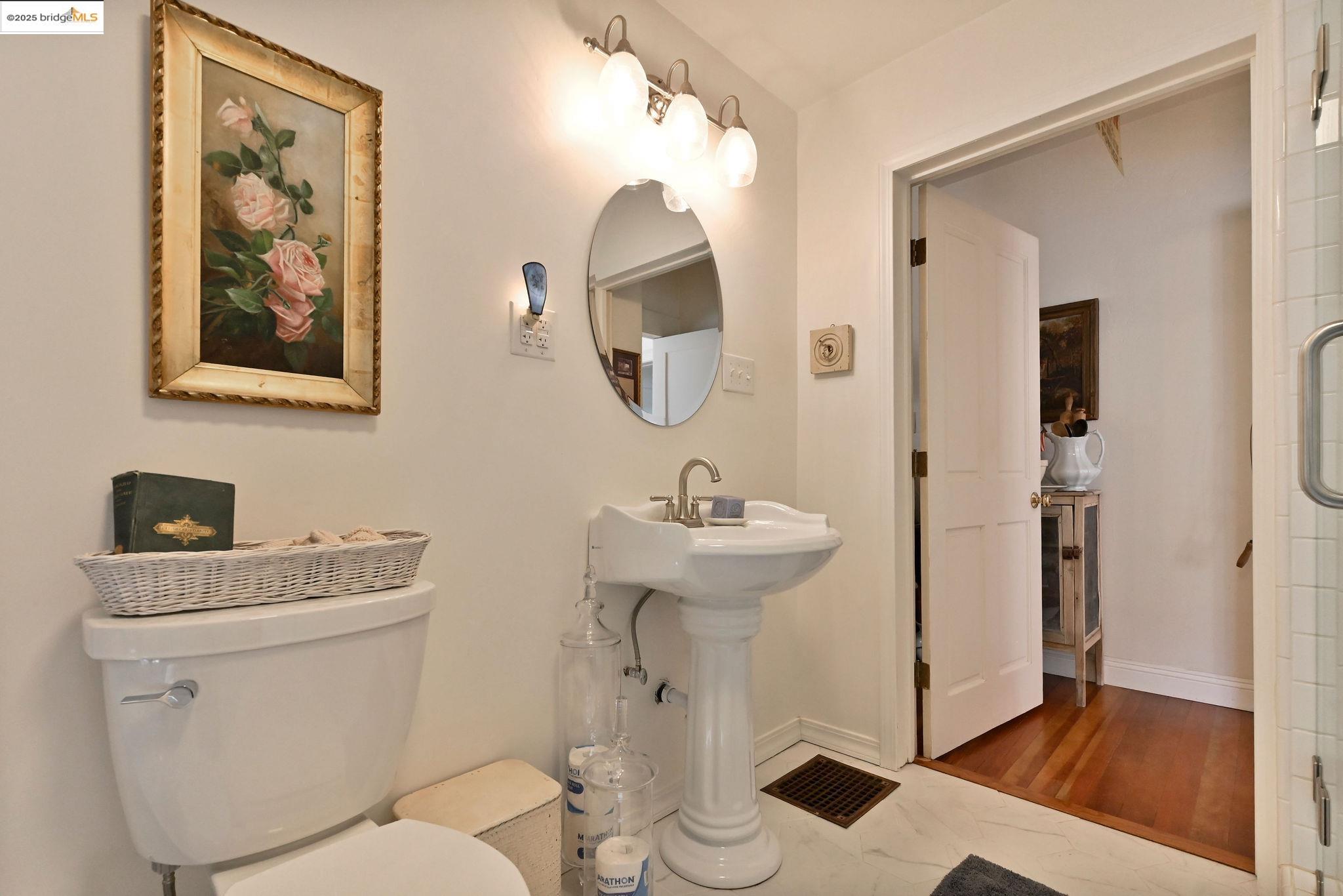 68 Church Hill Road San Andreas, CA 95249 - Photo 42 of 59 a bathroom with a toilet a sink and mirror