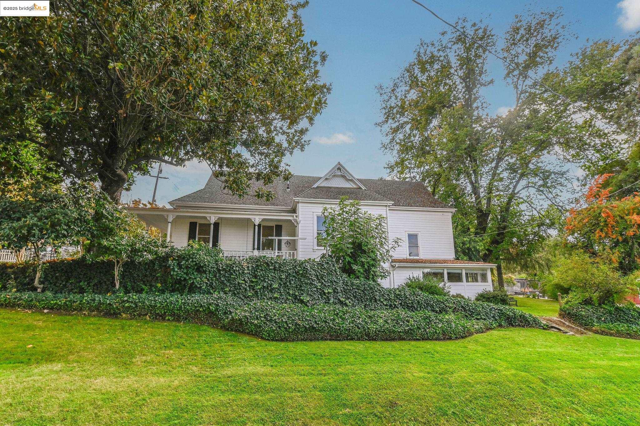 68 Church Hill Road San Andreas, CA 95249 - Photo 47 of 59 a front view of a house with a yard