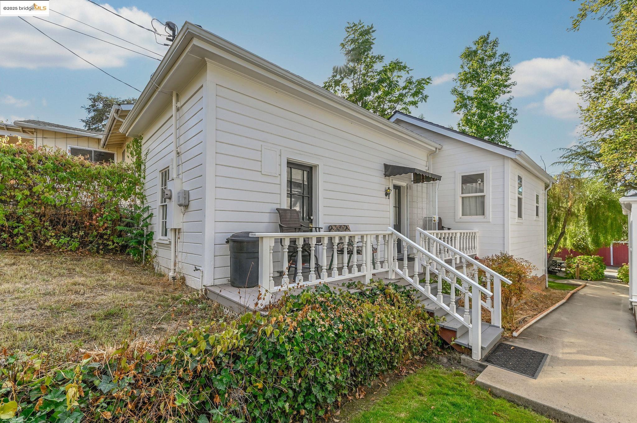 68 Church Hill Road San Andreas, CA 95249 - Photo 57 of 59 a view of a house with a yard and a garden
