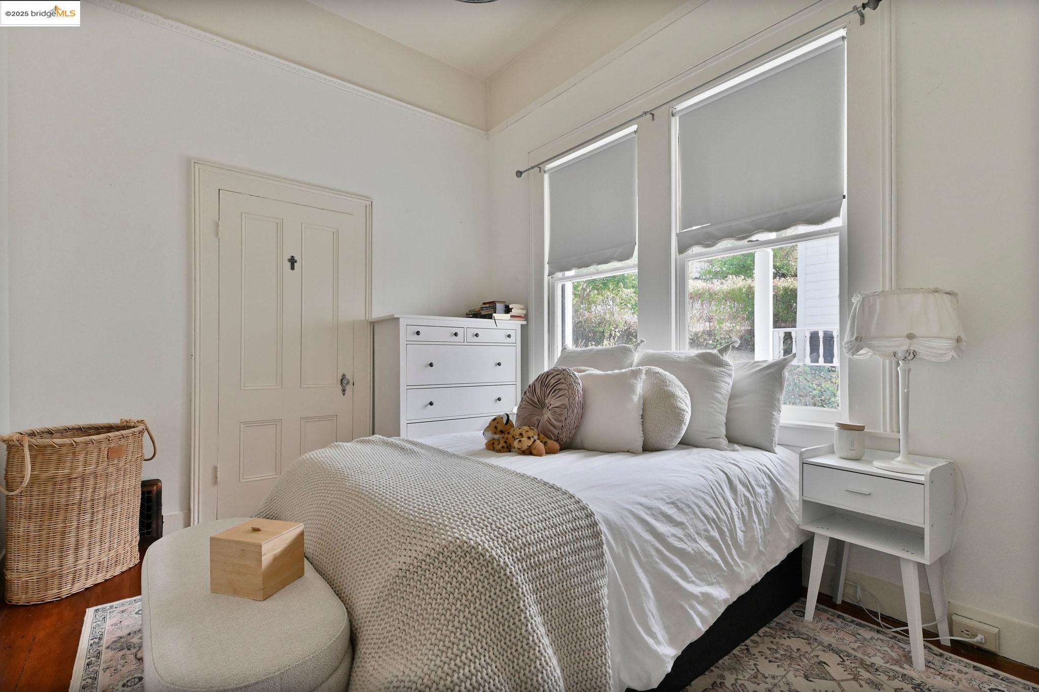 68 Church Hill Road San Andreas, CA 95249 - Photo 9 of 59 a bedroom with a bed and glass window