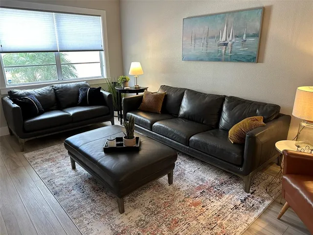 a view of a living room and dining room