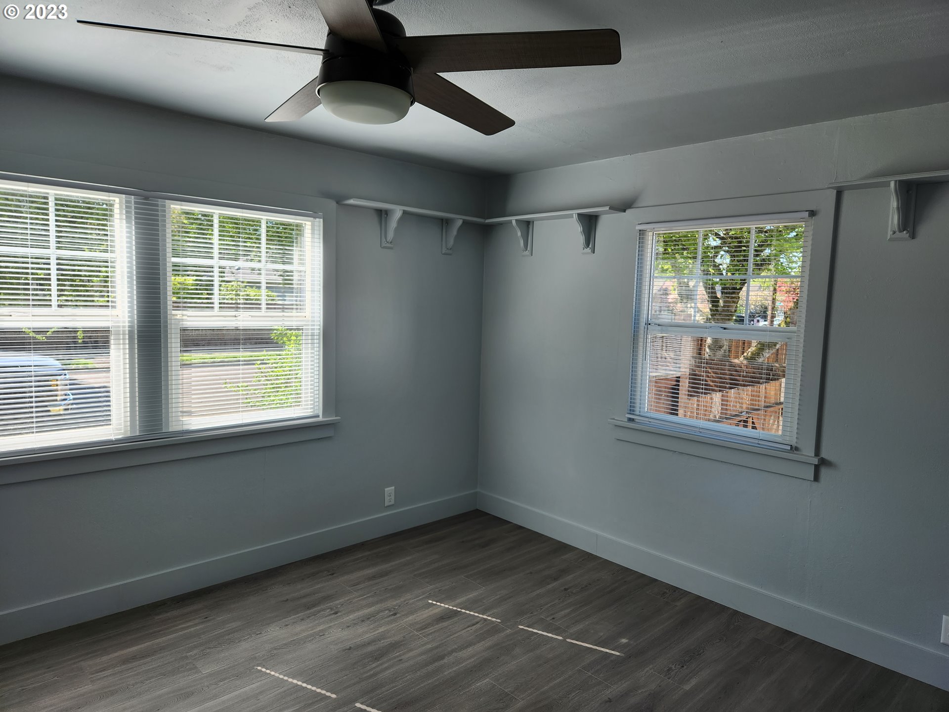607 7th Street Springfield, OR 97477 - Photo 10 of 15 an empty room with a window