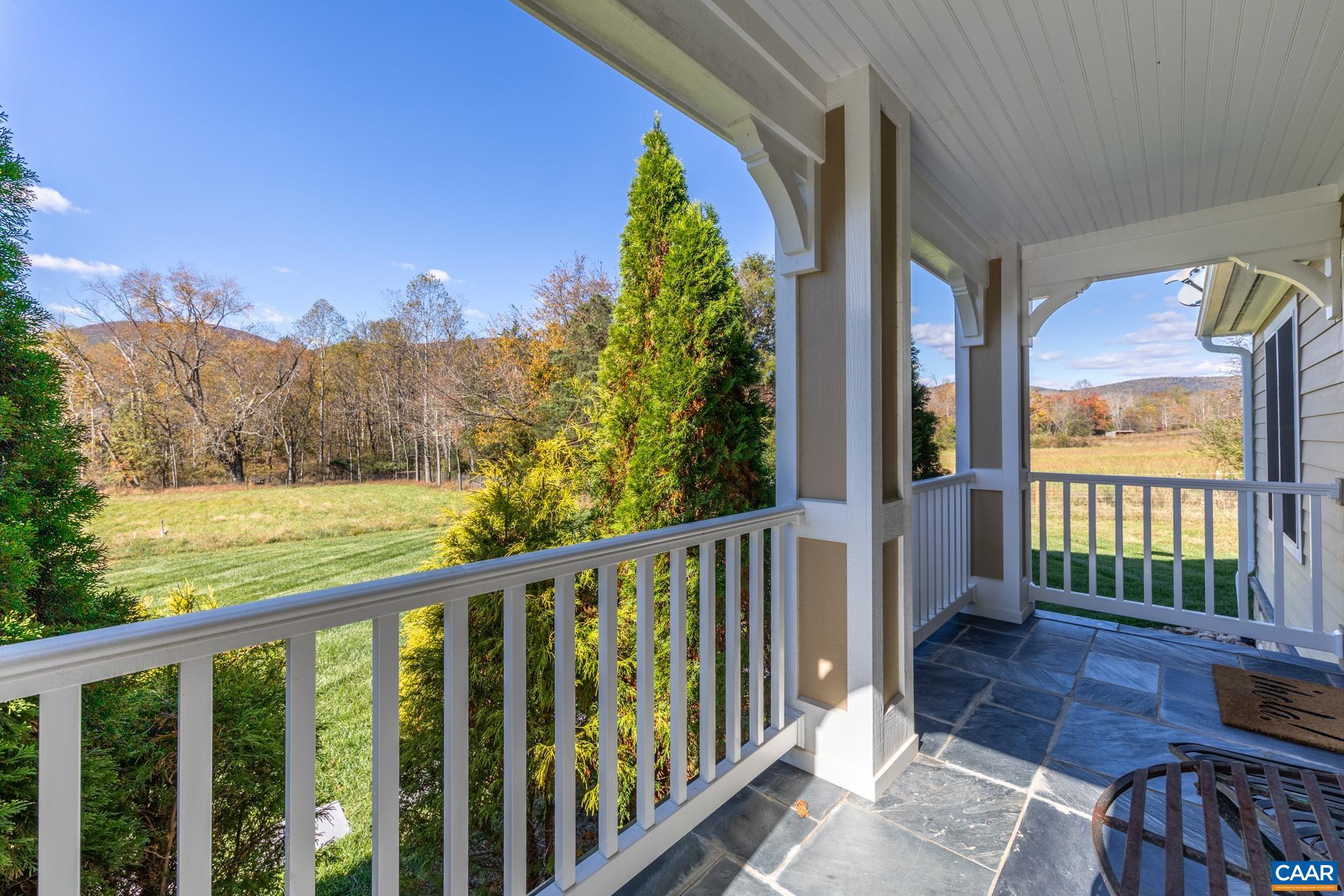 234 Creek Road Afton, VA 22920 - Photo 14 of 68 a view of a room with a large window and wooden floor