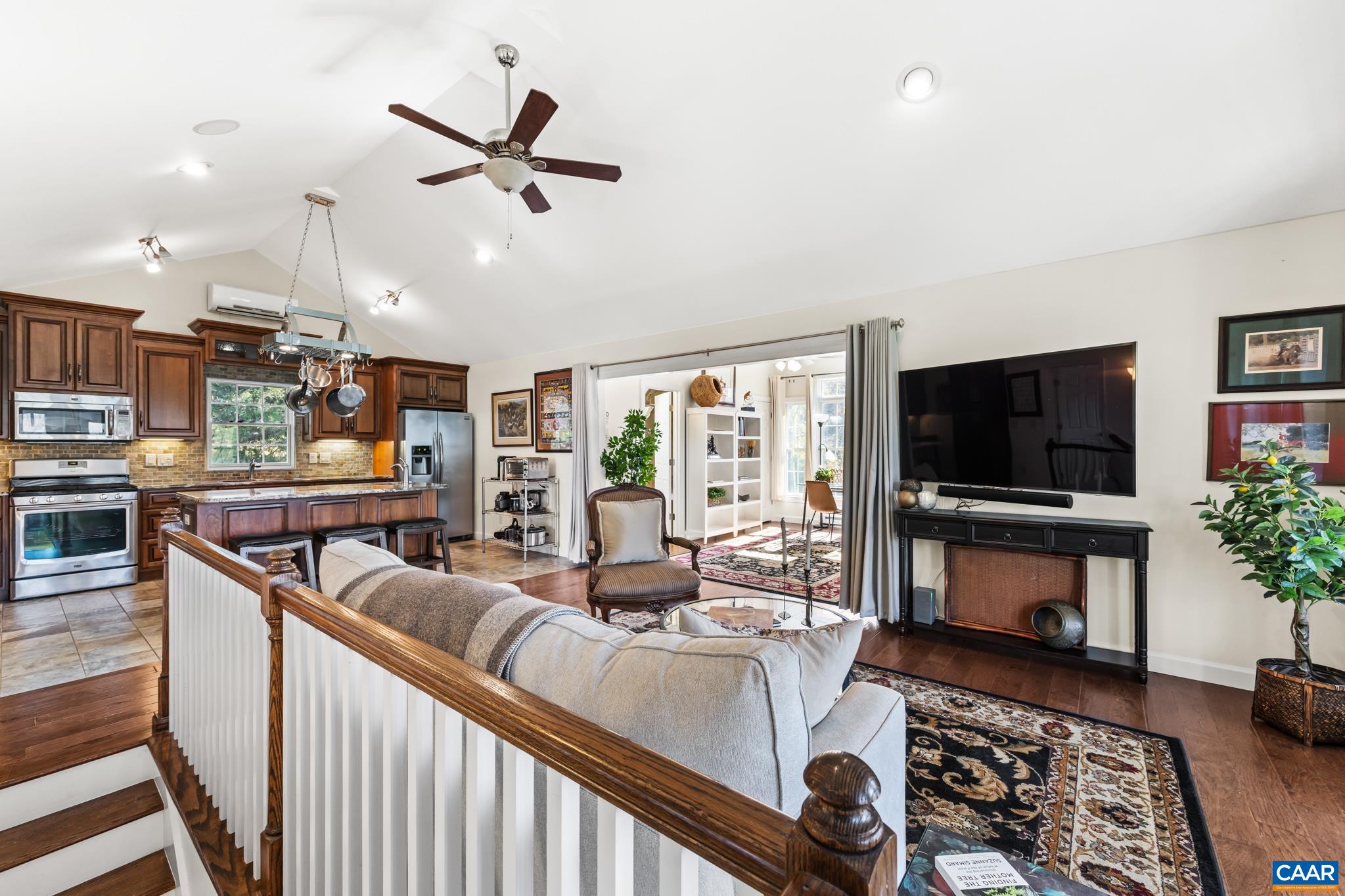 234 Creek Road Afton, VA 22920 - Photo 16 of 68 a living room with furniture and a flat screen tv