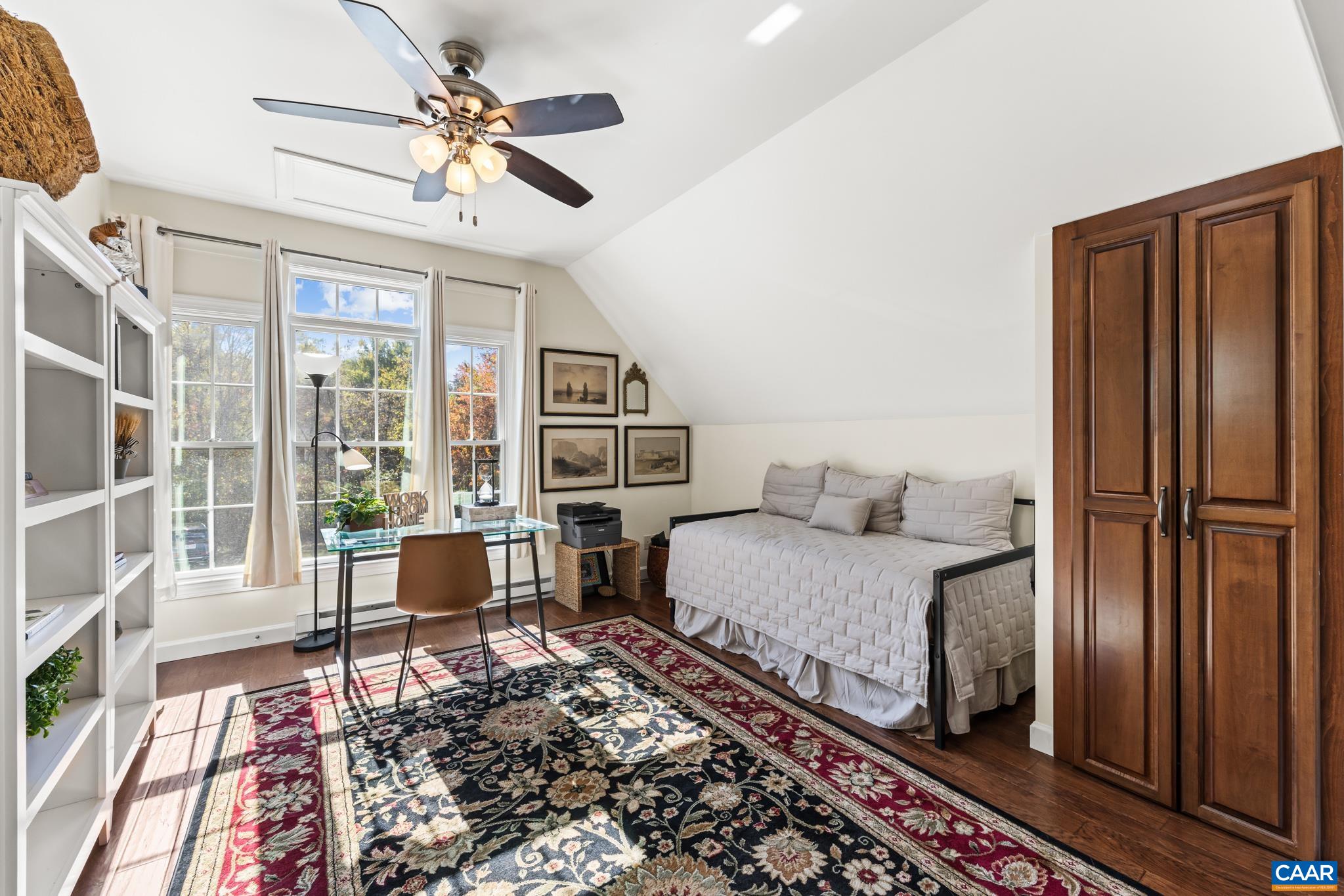 234 Creek Road Afton, VA 22920 - Photo 21 of 68 a bedroom with a bed and wooden floor