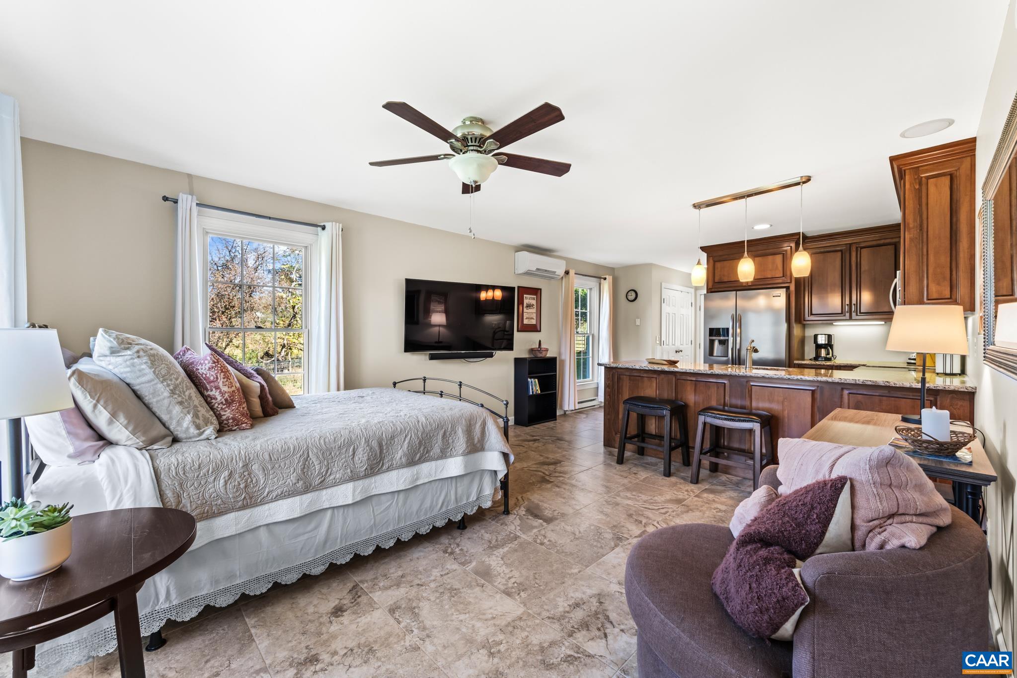 234 Creek Road Afton, VA 22920 - Photo 35 of 68 a living room with furniture and a flat screen tv