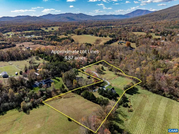 an aerial view of a house with a garden
