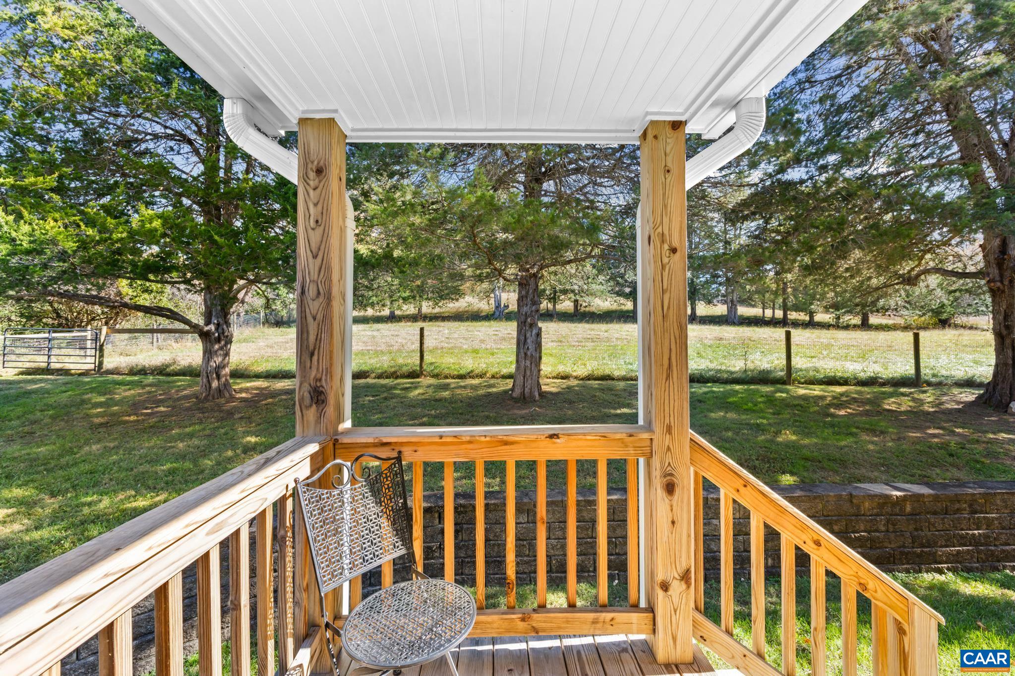 234 Creek Road Afton, VA 22920 - Photo 43 of 68 a view of a deck with a back yard