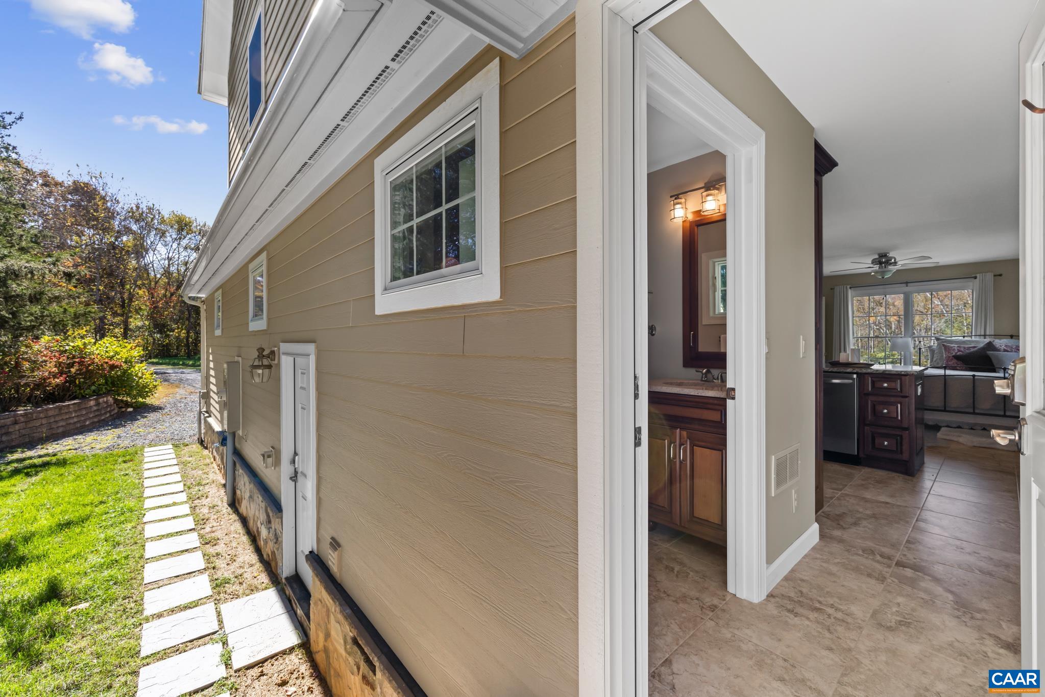 234 Creek Road Afton, VA 22920 - Photo 44 of 68 a view of a corridor and a outdoor space