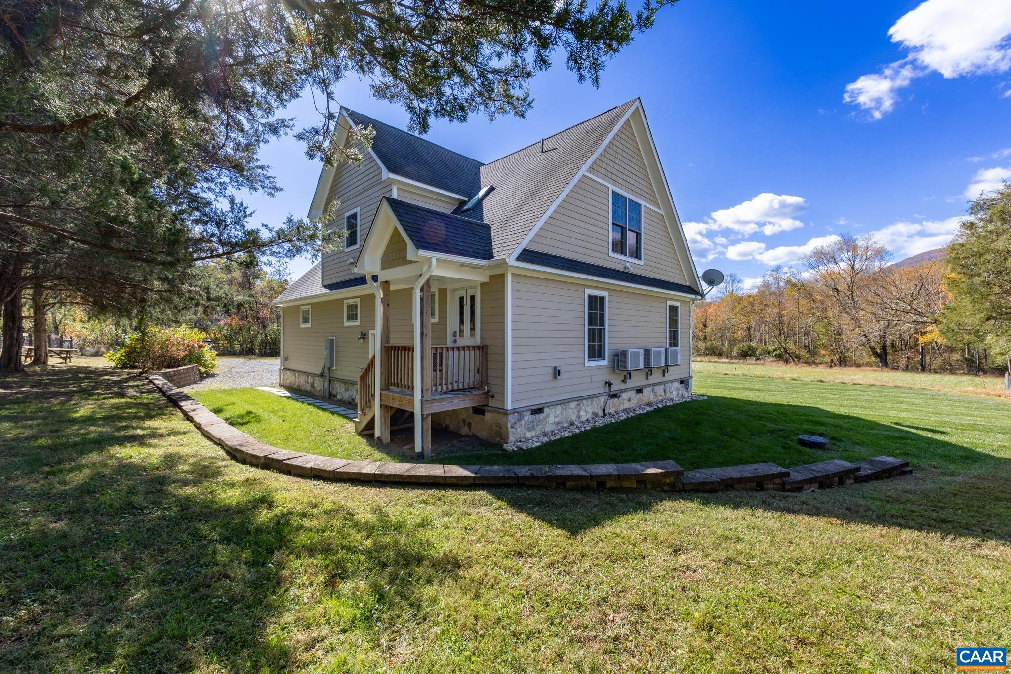 234 Creek Road Afton, VA 22920 - Photo 48 of 68 a view of a house with a yard