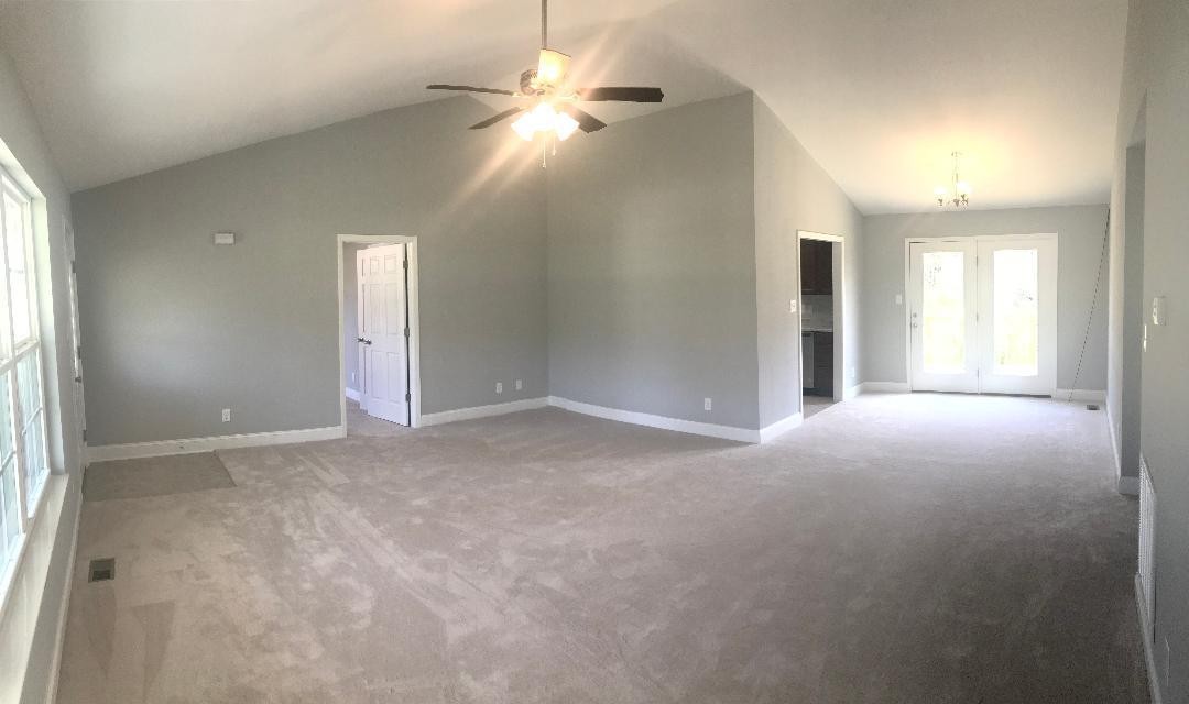 4546 Morganton Road Maryville, TN 37801 - Photo 4 of 15 an empty room with windows and fan