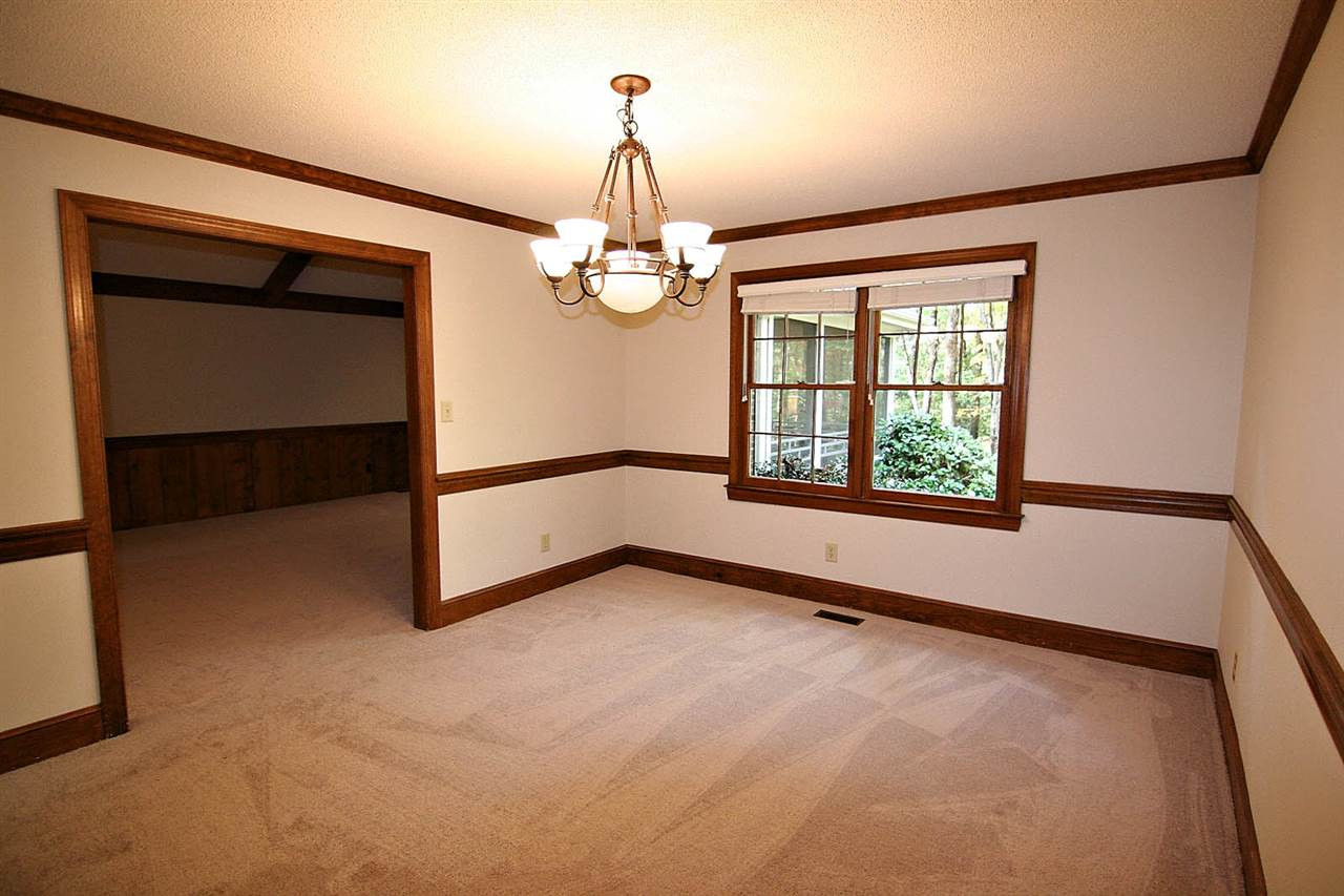 2816 Mattlyn Court Raleigh, NC 27613 - Photo 8 of 25 The Dining Space is a Joy for Casual or Formal Dinner Parties. Brand New Carpet and Paint. Notice the Chairrail and Crown Molding. Dining Room