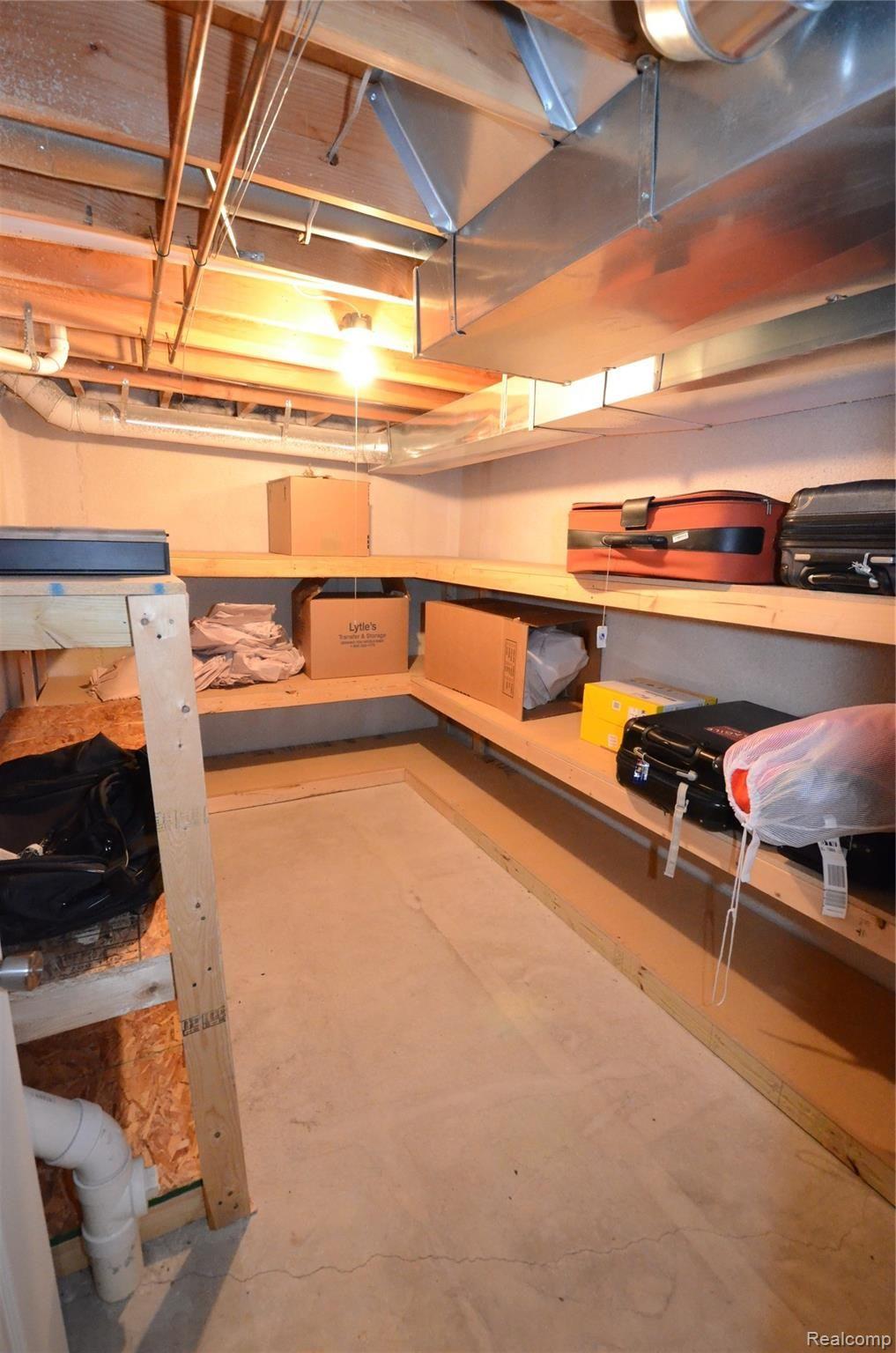 49301 Rockefeller Drive Canton, MI 48188 - Photo 49 of 58 Huge storage room in basement
