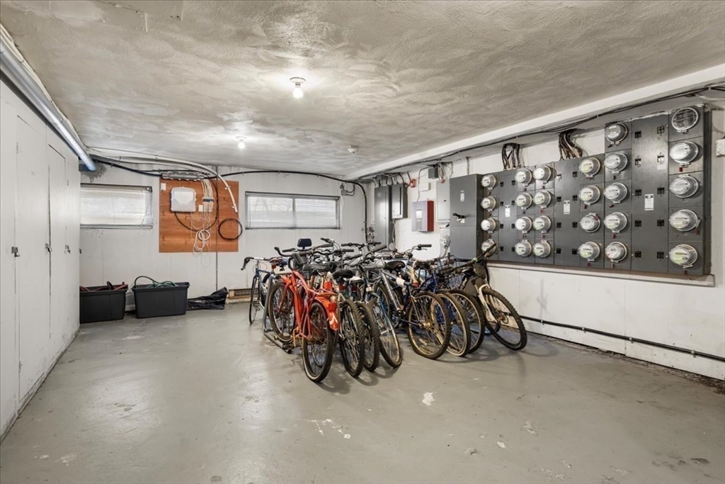 115 Grove Street, Unit 11 Boston, MA 02132 - Photo 20 of 29 a view of a room with gym equipment