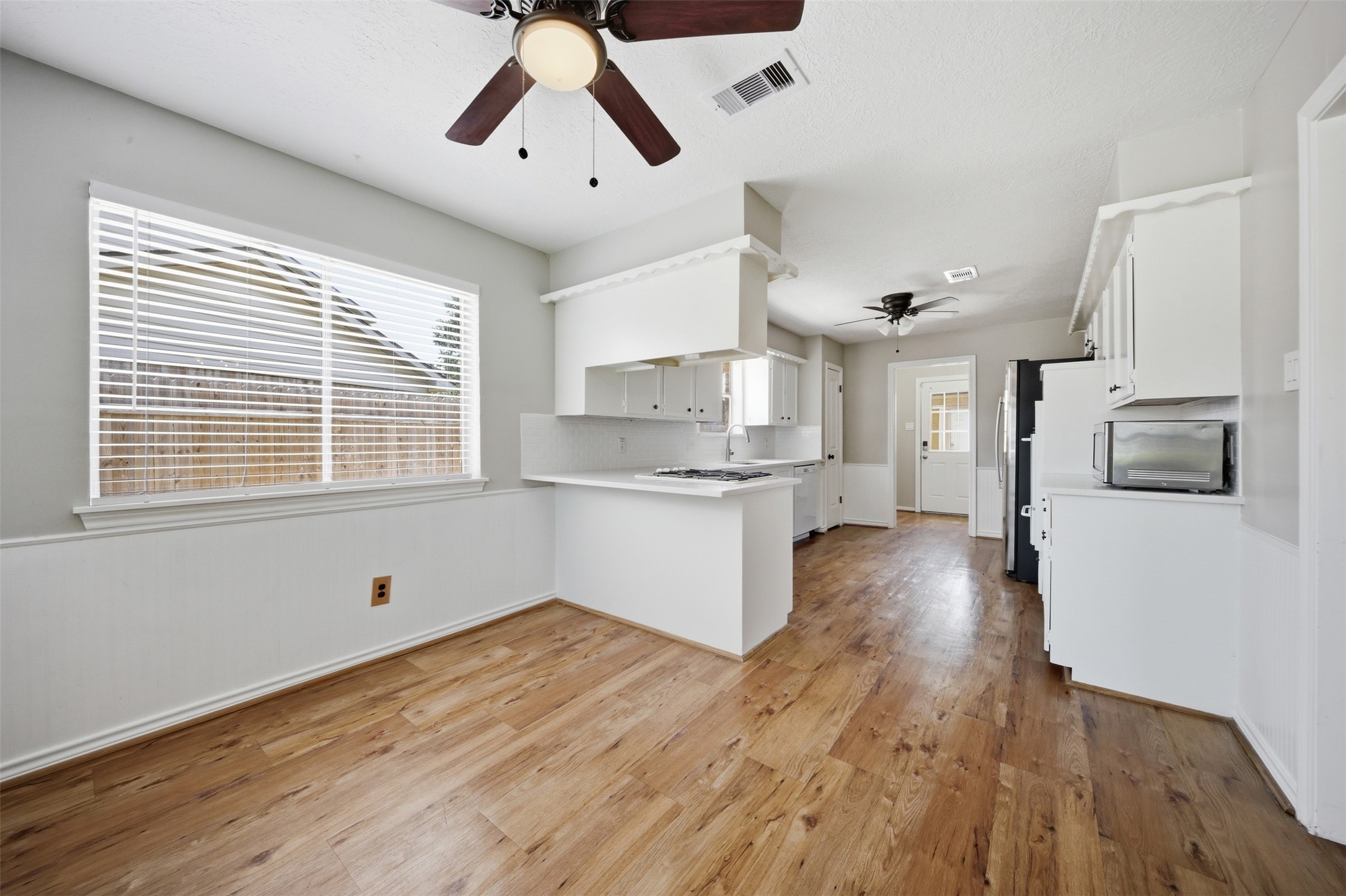 24015 Spring Mill Lane Spring, TX 77373 - Photo 15 of 49 Breakfast nook creates a comfortable gathering place for everyday meals.