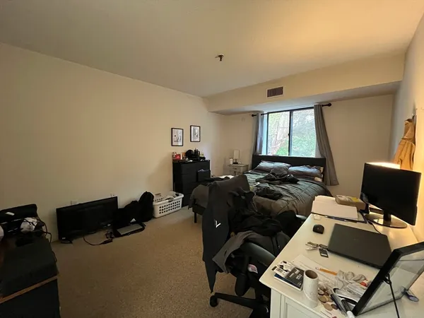 a room with a couch and a window