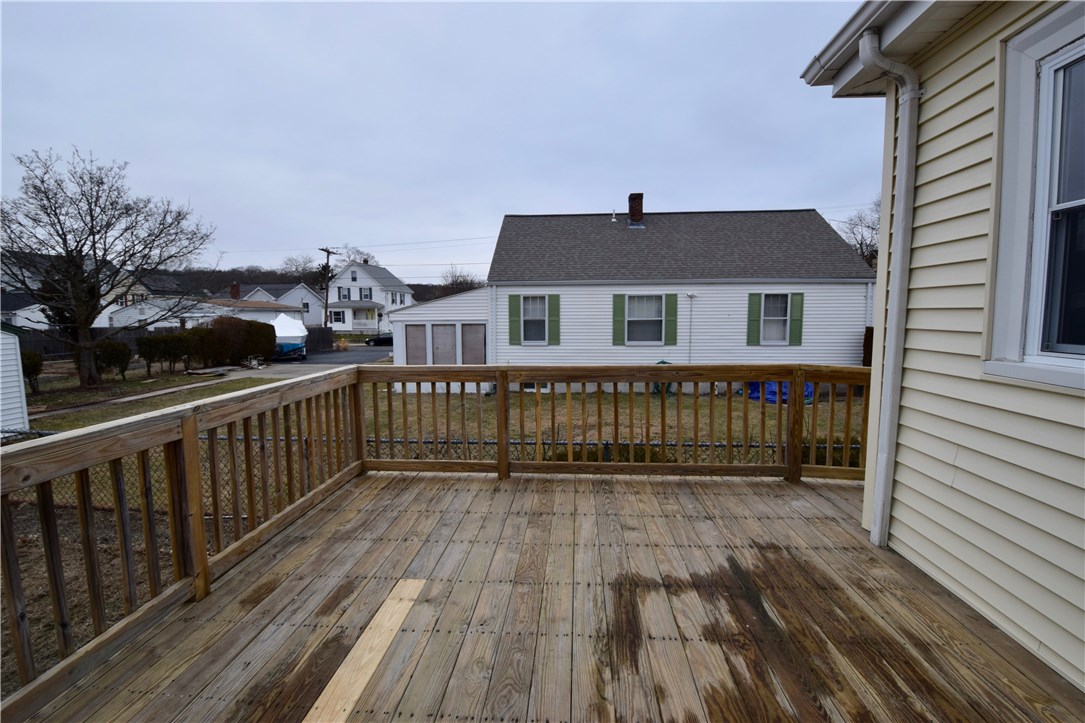 476 Power Road Pawtucket, RI 02860 - Photo 3 of 11 Large rear wrap-a-round deck.