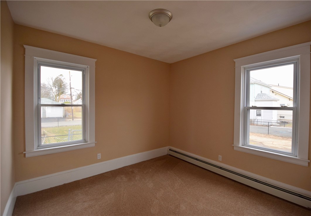 476 Power Road Pawtucket, RI 02860 - Photo 9 of 11 Bedroom with vinyl replacement windows.