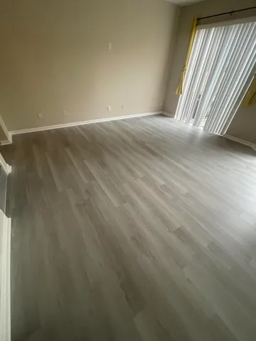 a view of an empty room and window