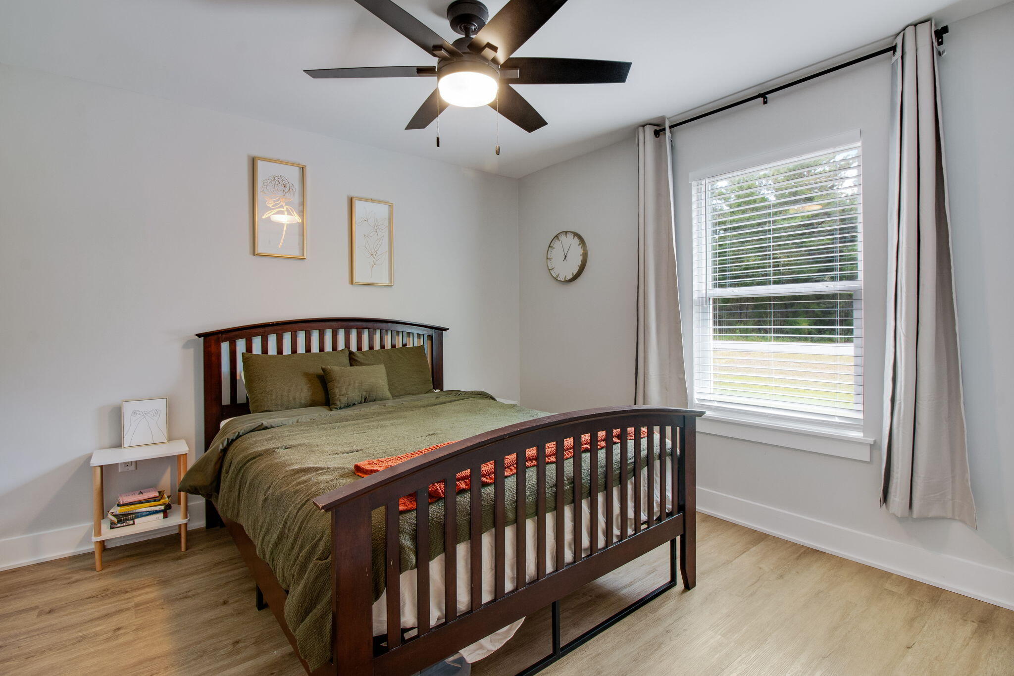 43 Crocus Avenue DeFuniak Springs, FL 32433 - Photo 12 of 20 a bedroom with a bed and a window